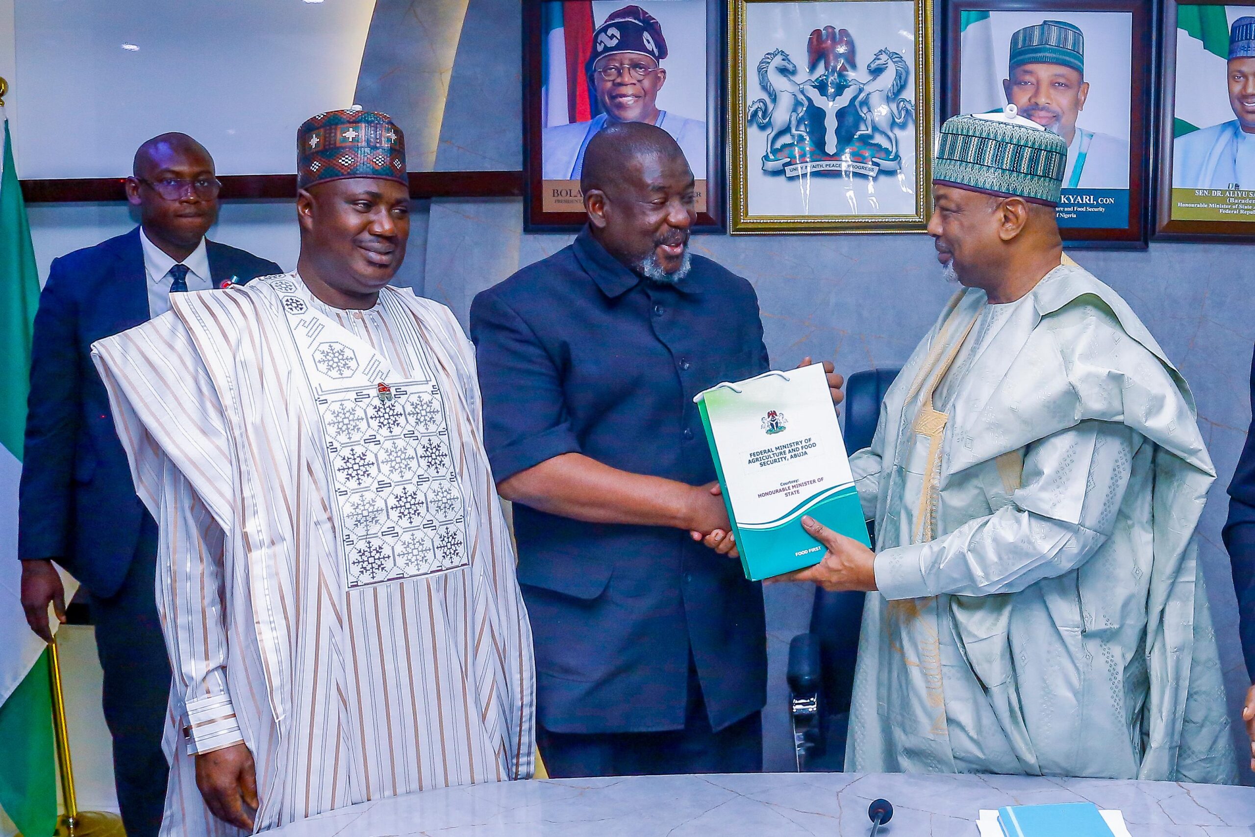 L-R Minister of State for Agriculture and Food Security, Sabi Abdullahi, IITA Director General, Simeon Ehui and the Minister of Agriculture and Food Security, Abubakar Kyari, at the signing of the agreement.