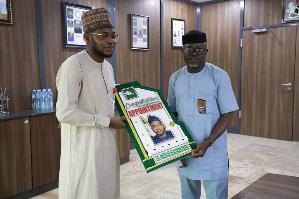 L R: NERC Chairman, Musiliu Oseni, and PCAN Chairman, Obas Esiedesa 