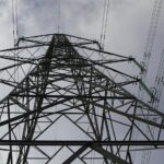 A transmission tower [PHOTO CREDIT: Ellesmere Port Cheshire https://www flickr com/photos/oneterry/15143973918]