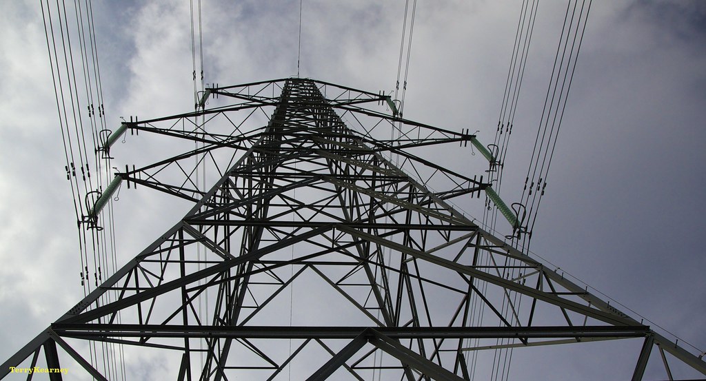 A transmission tower [PHOTO CREDIT: Ellesmere Port Cheshire https://www flickr com/photos/oneterry/15143973918]