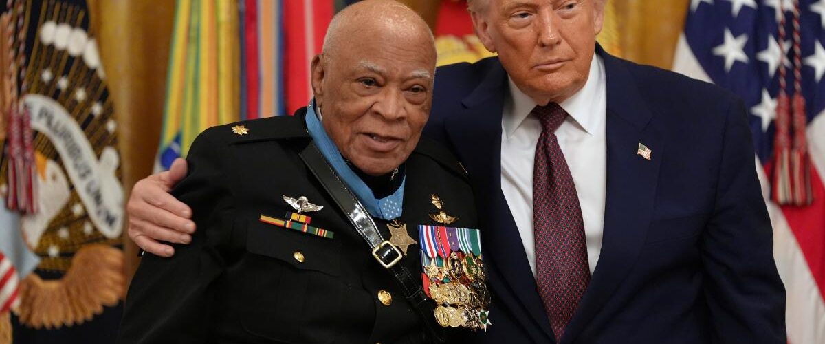 Major James Capers Jr is presented the Medal of Honor by Mr Trump during a Medal of Honour Ceremony on Thursday (Credit: AP photo)