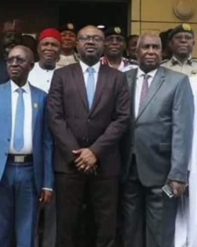 Minister of Interior, Olubunmi Tunji-Ojo (middle), with the investigation committee chairman, Jonathan Kure (third from left front row) and other members of the committee after the presentation in Abuja